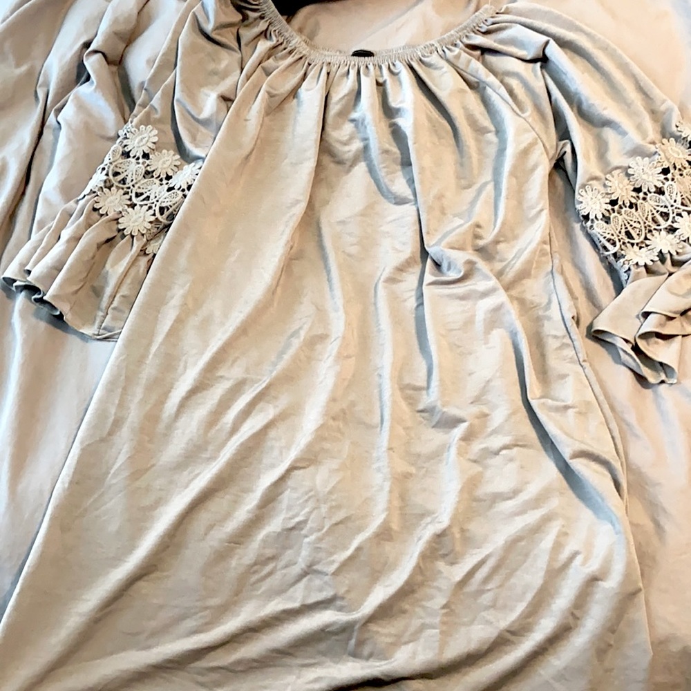 Winwin brand, grey tunic it is a s-m size
